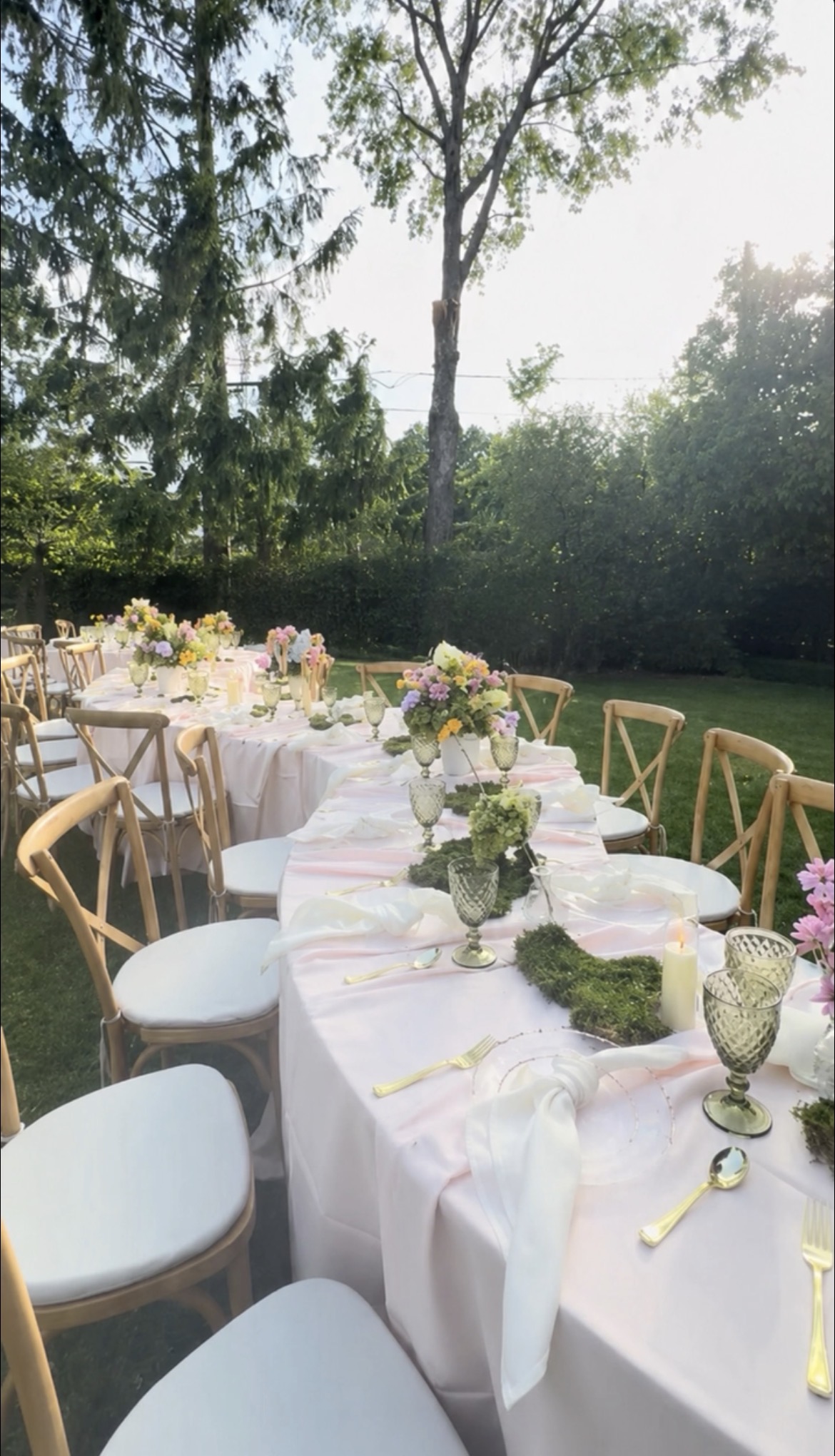 White garden reception with soft floral styling